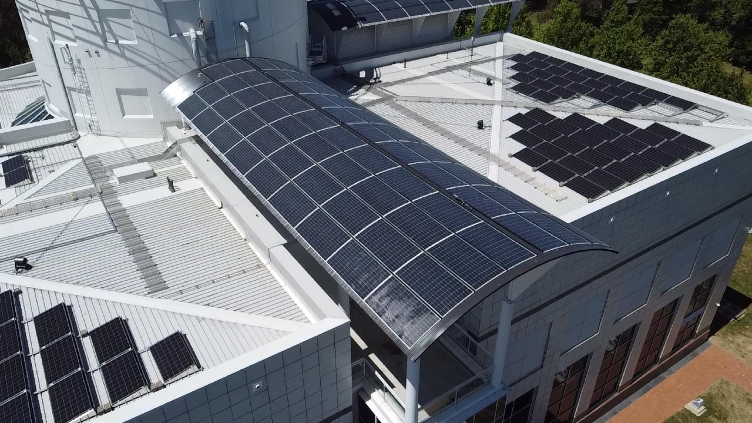 Curved rooftop of Questacon with solar PV modules